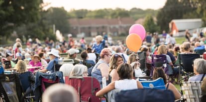 Photo of crowd in Greenfield Park for summer concert 